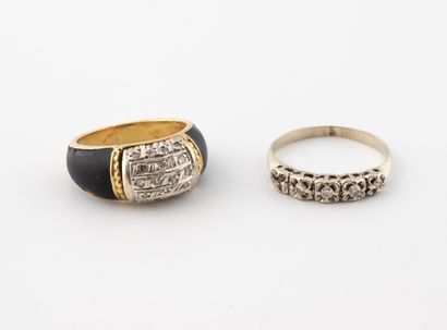 Two rings:
- A white gold (750) American...