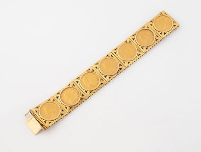 Bracelet articulé en or jaune (750) orné...
