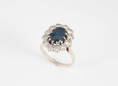 White gold (750) ring set with an oval faceted...