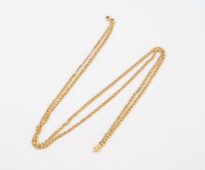 Two-row fancy mesh necklace in yellow gold...