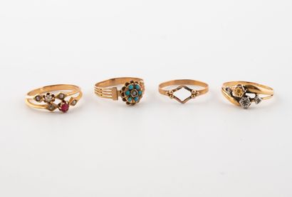 Lot of four yellow gold (750) rings, one...