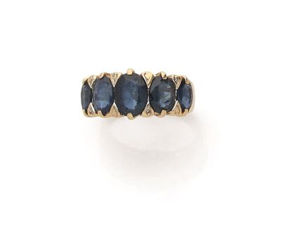 Band ring in 750 thousandths gold, set with...