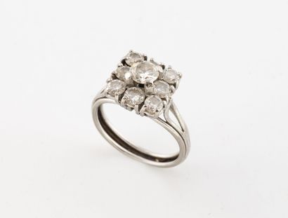 A white gold (750) ring with a square top...