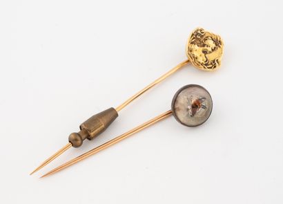 Two jabot pins :
- one with a female bust...