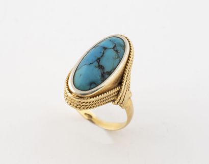 Yellow gold (750) ring set with an oval turquoise...