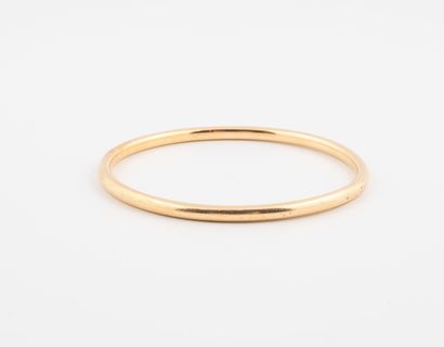 Bracelet jonc en or jaune (750). 
Poids :...