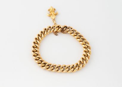 Bracelet en or jaune (750) à maille gourmette...