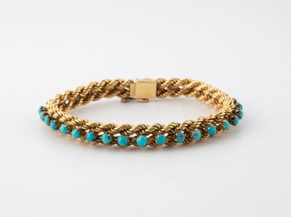Bracelet en or jaune (750) à maille torsadée...