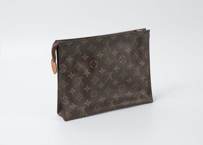 Louis VUITTON Paris
Trousse en toile Monogram.
Fermeture...