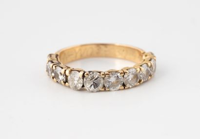 Half American wedding band in fluted yellow...