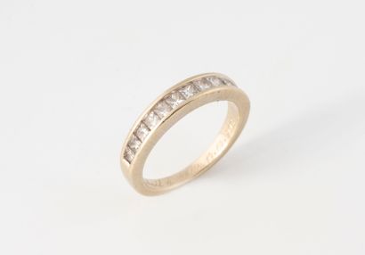 Wedding band in yellow gold (750) set with...