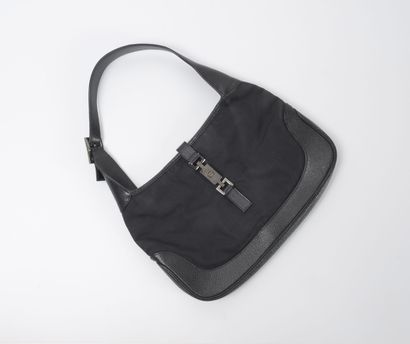 GUCCI
Sac Jackie en toile et cuir noir.
Intérieur...