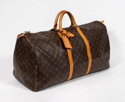 Louis VUITTON Paris, Keepall 
Sac de voyage...