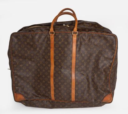 LOUIS VUITTON, Paris 
Valise souple en cuir...