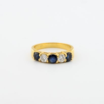 Half wedding band in yellow gold (750) set...