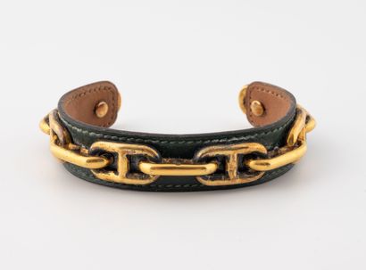 HERMES PARIS
Rigid bracelet in gilt metal...