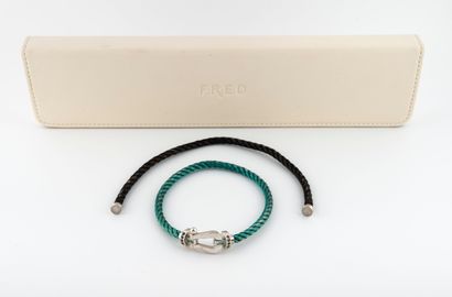 FRED, Force 10
Blue cord bracelet with white...