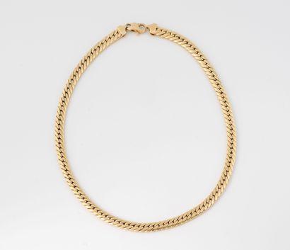 Necklace in yellow gold (750) with flattened...