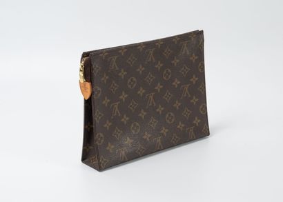 Louis VUITTON Paris
Trousse en toile Monogram.
Fermeture...