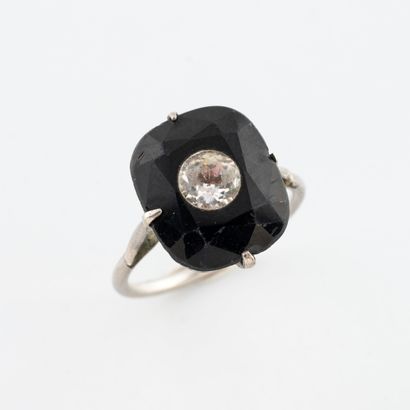 Silver (925) ring set with a faceted cushion-cut...