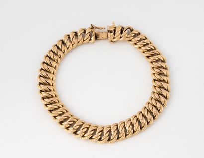 American link bracelet in yellow gold (750).
Ratchet...