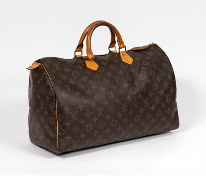 Louis VUITTON Paris, Speedy
Sac en toile...