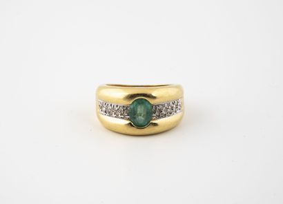 Yellow and white gold (750) band ring centered...