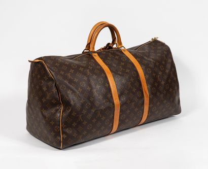 Louis VUITTON Paris, Keepall 
Sac de voyage...