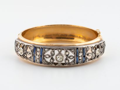 Yellow gold (750) and silver (800) openwork...