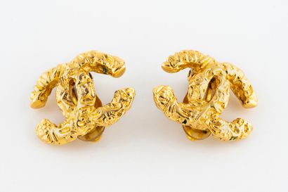 CHANEL Paris.
Pair of ear clips in textured...