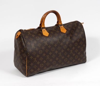 Louis VUITTON Paris, Speedy
Sac en toile...