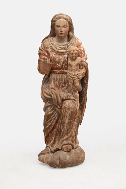 Vierge à l'Enfant. 
Sculpture en bois, avec...