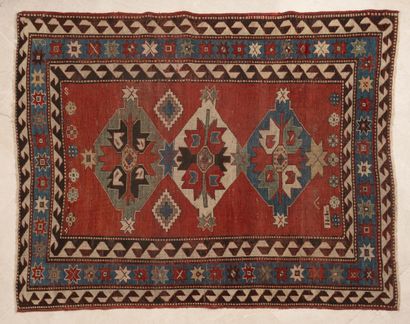 Kazak carpet with geometric design composed...