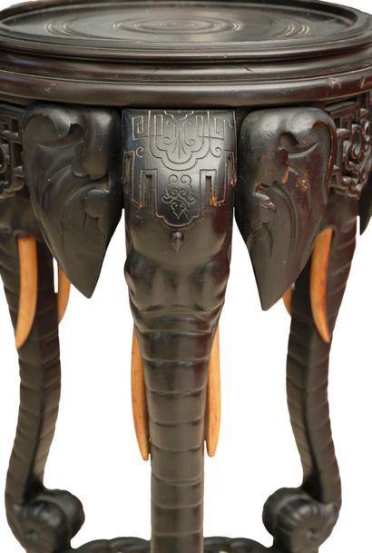 Large tripod saddle in blackened wood with...