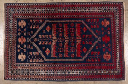 Four polychrome wool carpets :
- one with...