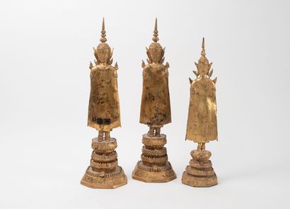 THAILANDE, XXème siècle.
Set of three standing...