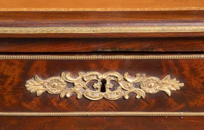 Veneered flat desk opening at the waist with...