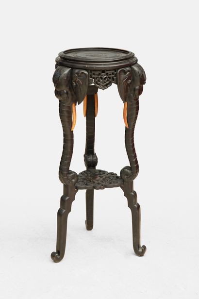 Large tripod saddle in blackened wood with...
