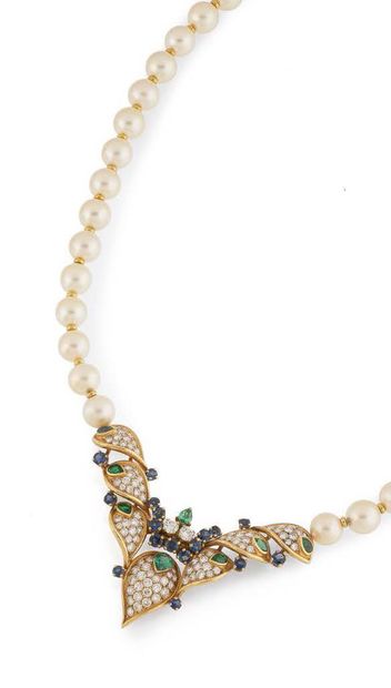 Elegant necklace formed of a strand of white...
