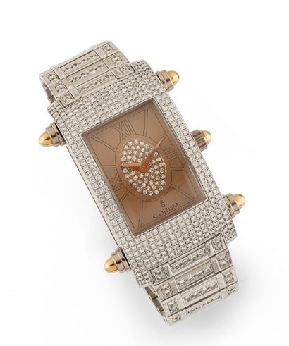 CORUM
Beautiful wristwatch in white and yellow...