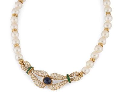 Necklace formed of a row of white cultured...