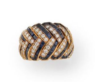 Yellow gold (750) band ring with braided...