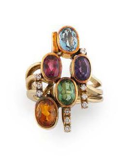 Importante bague en filins d'or jaune (750)...
