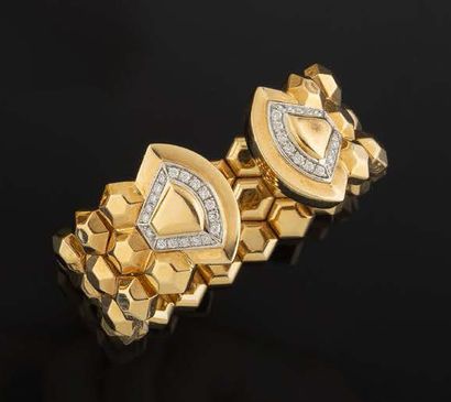 FOPE
Semi-rigid open bracelet in yellow gold...
