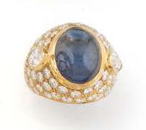 ¹ Cambered yellow gold (750) ring paved with...
