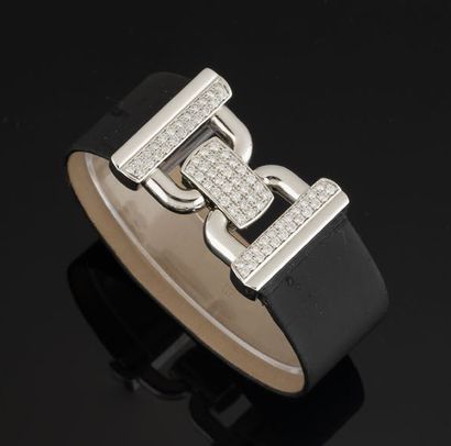 PIAGET
Bracelet featuring a wide black satin...