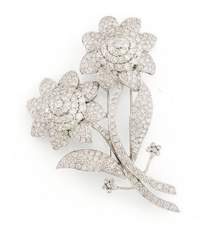 CHAAR
White gold (750) lapel clip featuring...