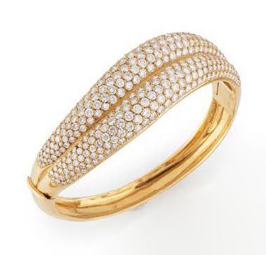 Bracelet jonc ouvrant en or jaune (750) à...