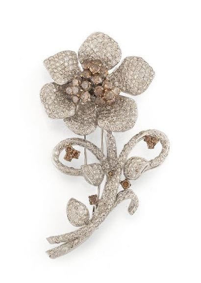 CHAAR
Important white gold (750) lapel clip...