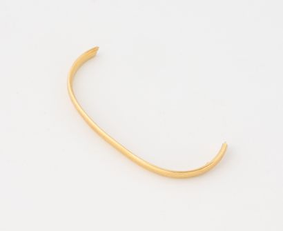 Débris d'alliance en or jaune (750).
Poids...